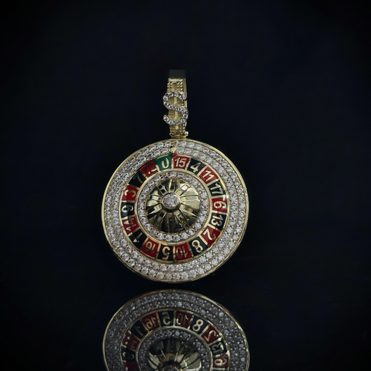 DIJE RULETA en Oro 10K  – Edición Exclusiva