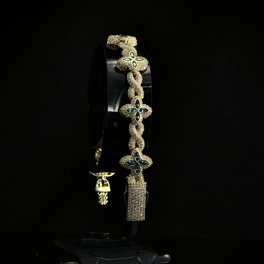PULSO FLOR DE LUJO ZIRCONIA AZUL ORO 10k. 18cm